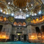 BAKAN ERSOY AÇIKLADI: "AYASOFYA'DA SÜREÇ DEVAM EDİYOR, SULTANAHMET'TE ÇALIŞMALAR TAMAMLANDI" AYASOFYA İ KEBİR CAMİİ'NDE CUMHURİYET TARİHİNİN EN KAPSAMLI RESTORASYONU GERÇEKLEŞTİRİLİYOR KÜLTÜR VE TURİZM BAKANI MEHMET NURİ ERSOY: "BATI BAHÇE'DE SÜRDÜRÜLEN ÇALIŞMALARLA BU MEKANLARA BAĞLI YÜZLERCE METRE UZUNLUĞUNDAKİ 7 TÜNEL HATTINI DA BELGELEDİK. "BU TÜNELLERDEN ŞU ANA KADAR BİN 68 TON TOPRAK DOLGUYU TAHLİYE EDEREK TEMİZLEDİK" "KUZEY, DOĞU VE GÜNEY CEPHELERİ İLE MİNARESİNDE YAKLAŞIK 11 BİN METREKARE İSKELE KURULUMU YAPTIK" RESTORASYON ÇALIŞMASI SIRASINDA 1600 YILLIK 7 ADET TÜNEL ORTAYA ÇIKTI